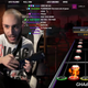 Imagen para el artículo titulado Bate un récord mundial con la canción más difícil de Guitar Hero mientras contesta comentarios en Twitch y se aguanta las ganas de ir al baño